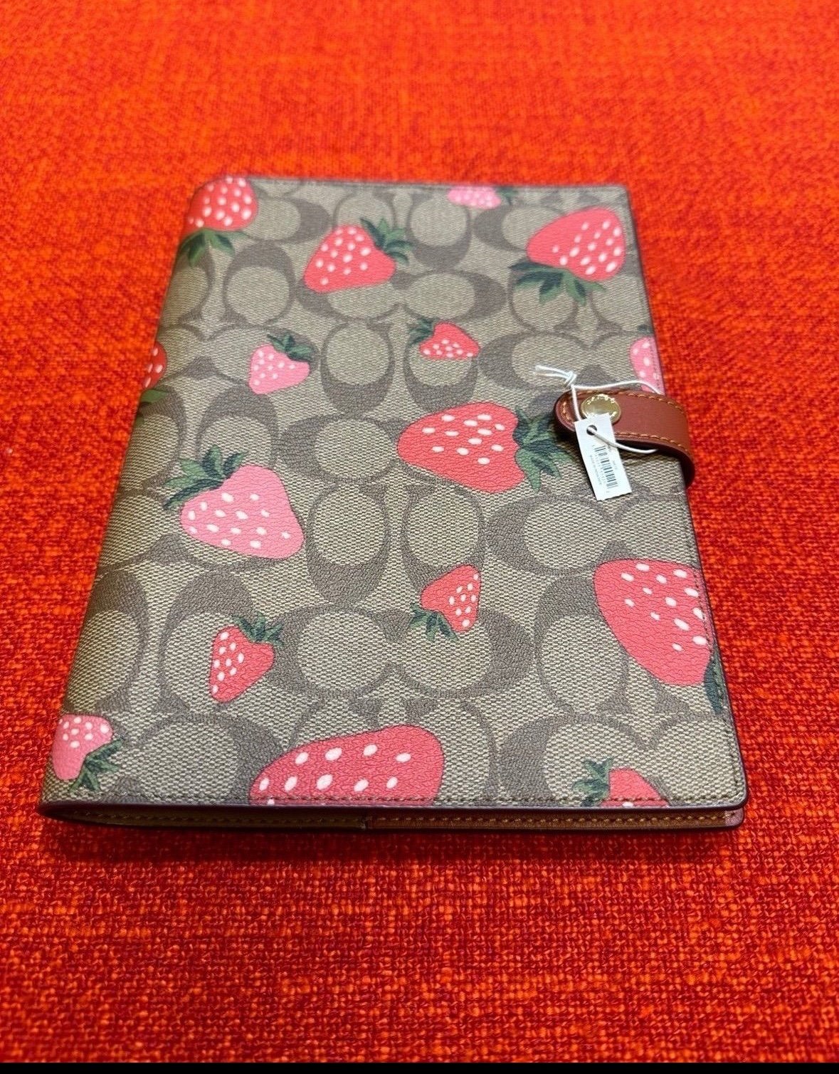 Coach notebook in signature canvas with wild strawberry print