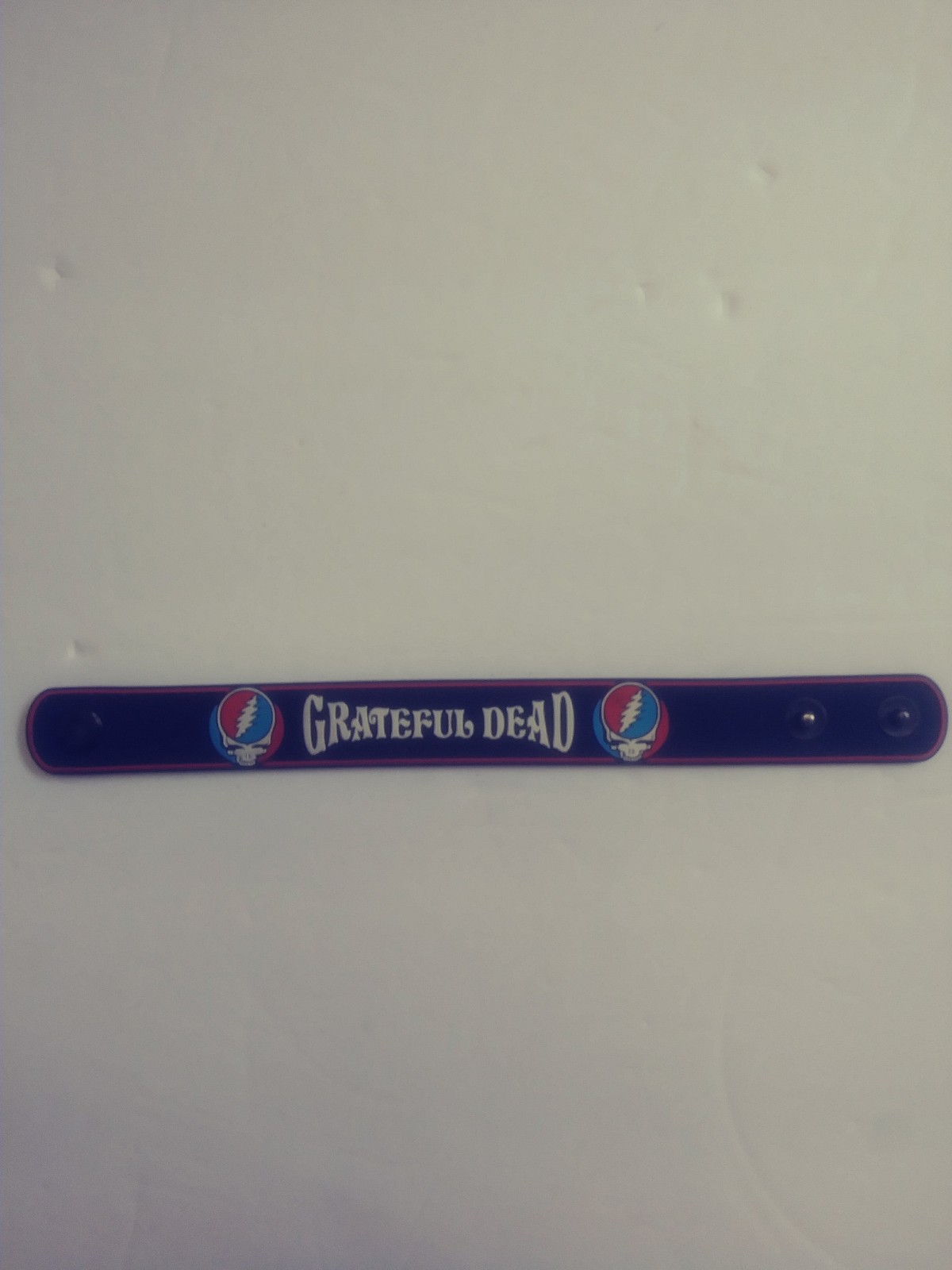 Grateful Dead Steal Your Face Skull 8-1/2 Synthetic Button Snap Bracelet