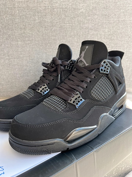 Jordan 4 Black sneakers, fashionable men's shoes size 10