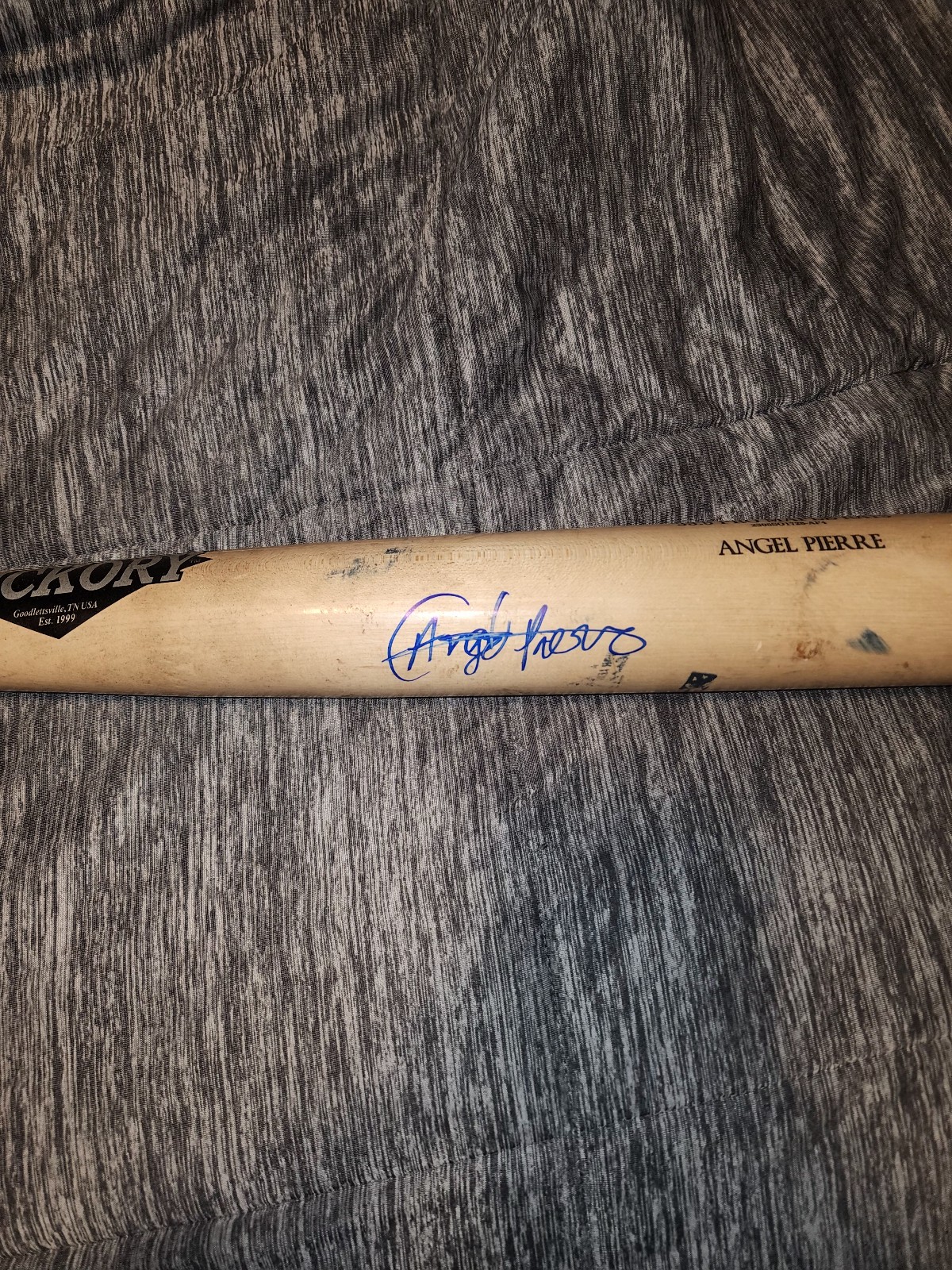 Angel Pierre signed game used cracked bat