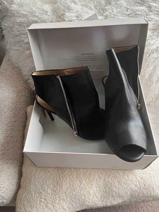 Pre-Loved Peep-Toe Heel Sandal; approx. 3 3/4 heel. Black w/gold zippered bling;