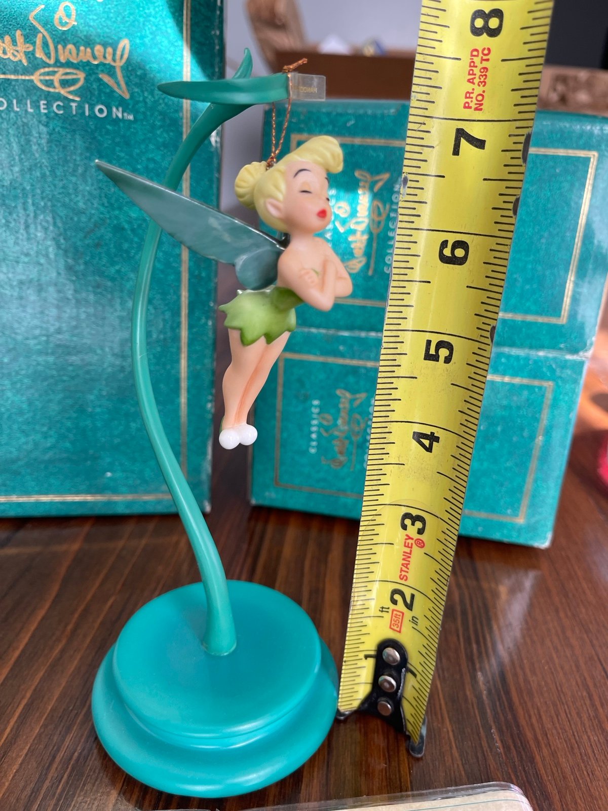 1996 special edition Tinker Bell ornament and stand.