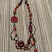 Lot of Vintage Deco Style Jewelry. 5 Necklaces, 2 Pins, 1 clip on earrings.