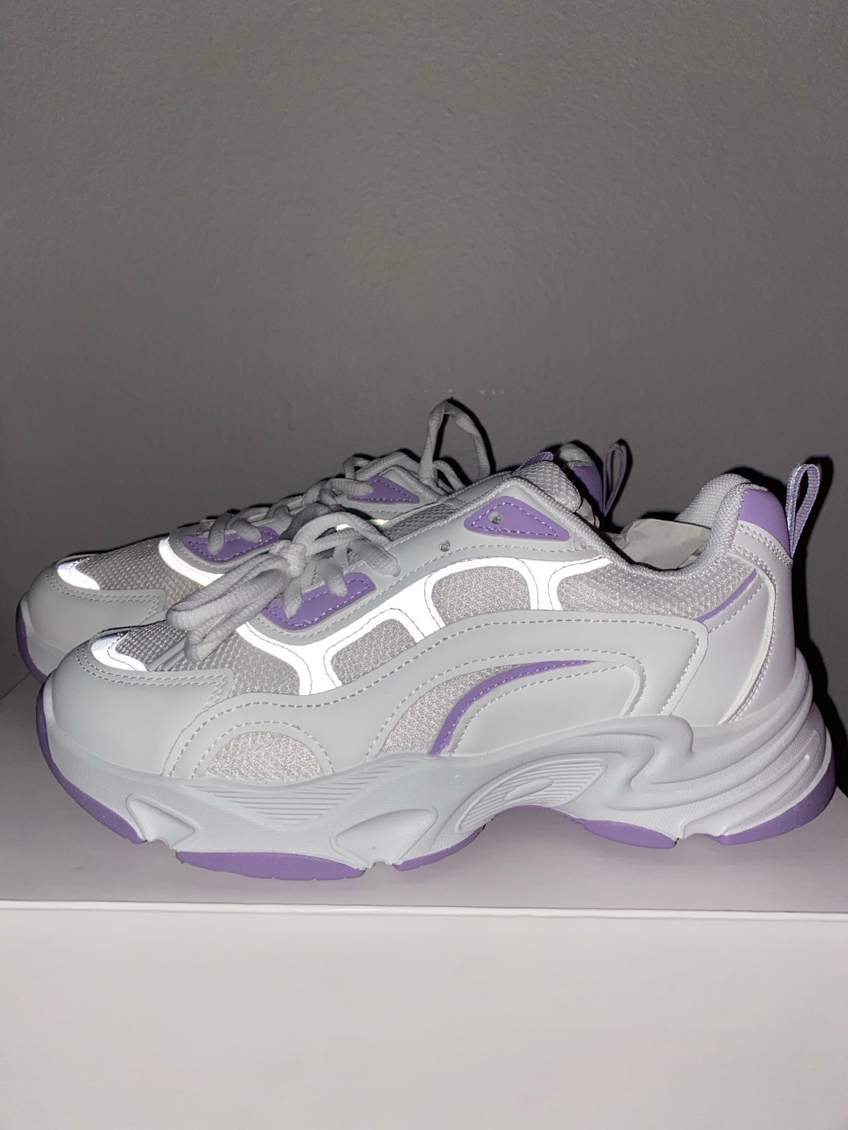 Purple and white running shoes