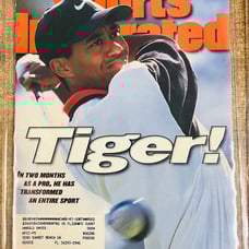 ( 4 ) Tiger Woods sports illustrated magazines in good to fair condition