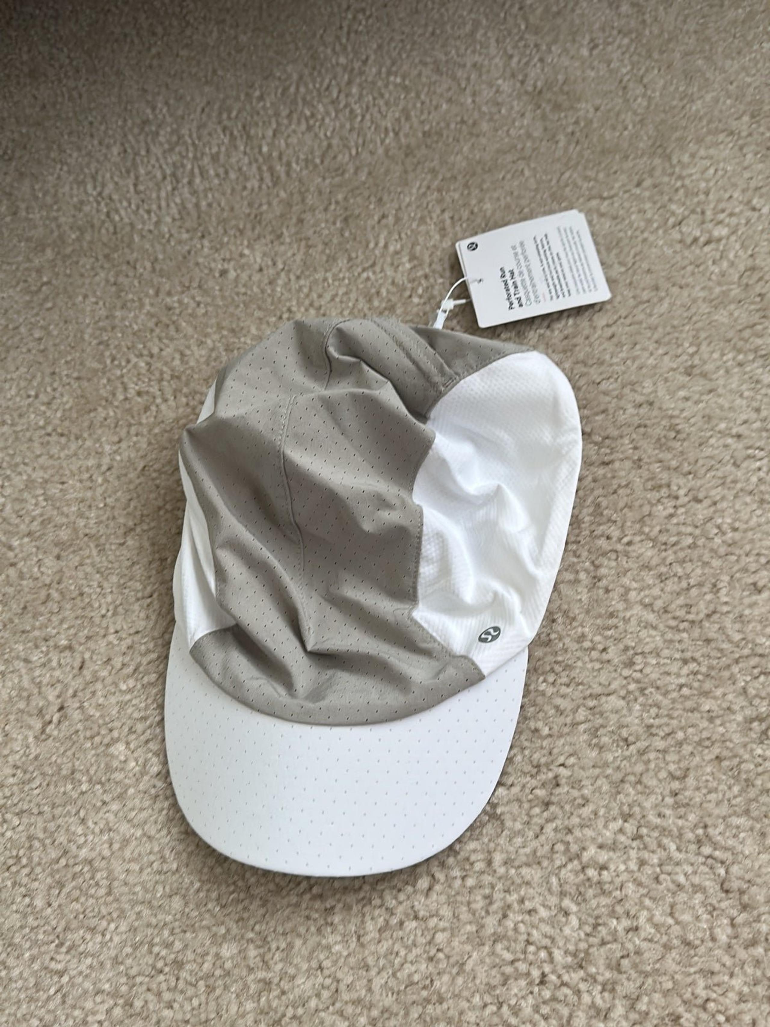 BNWT Perforated Run and Train Hat Size L/XL