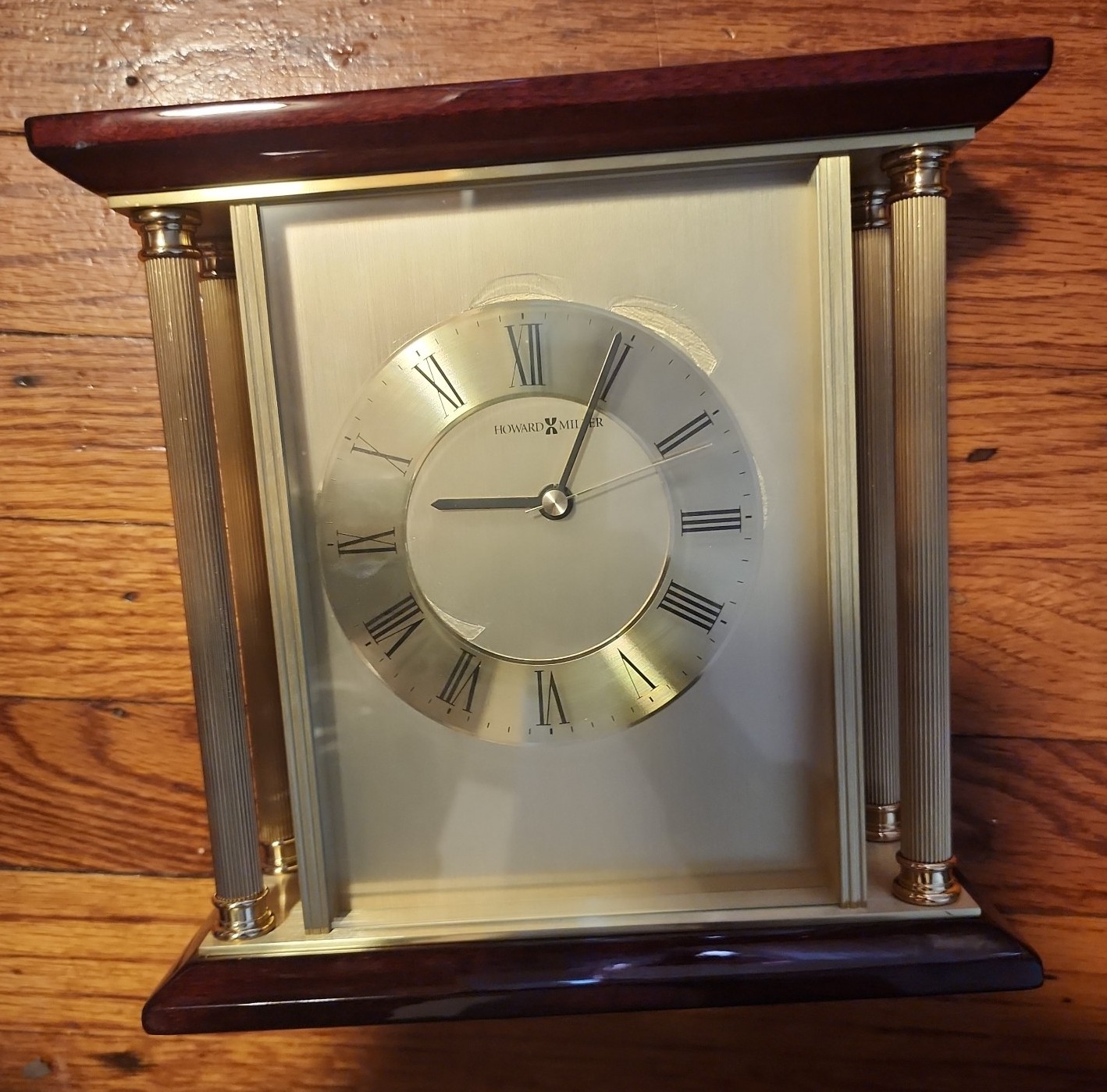 Howard Miller “Carlton” Tabletop Clock. Rosewood Hall & Brilliant Brass Features