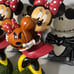 Minnie holding a pumpkin decorc