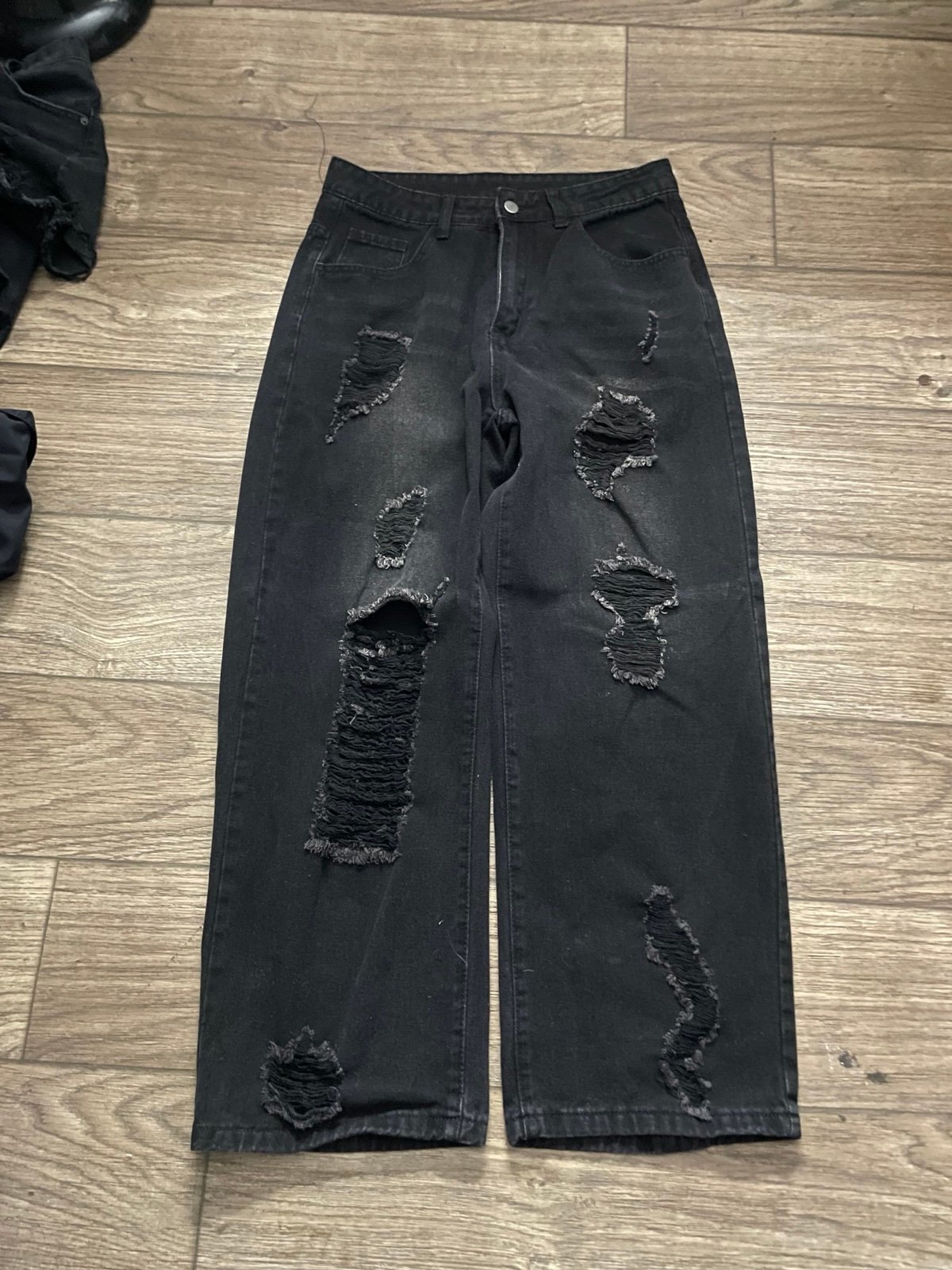 Distressed faded black jeans
