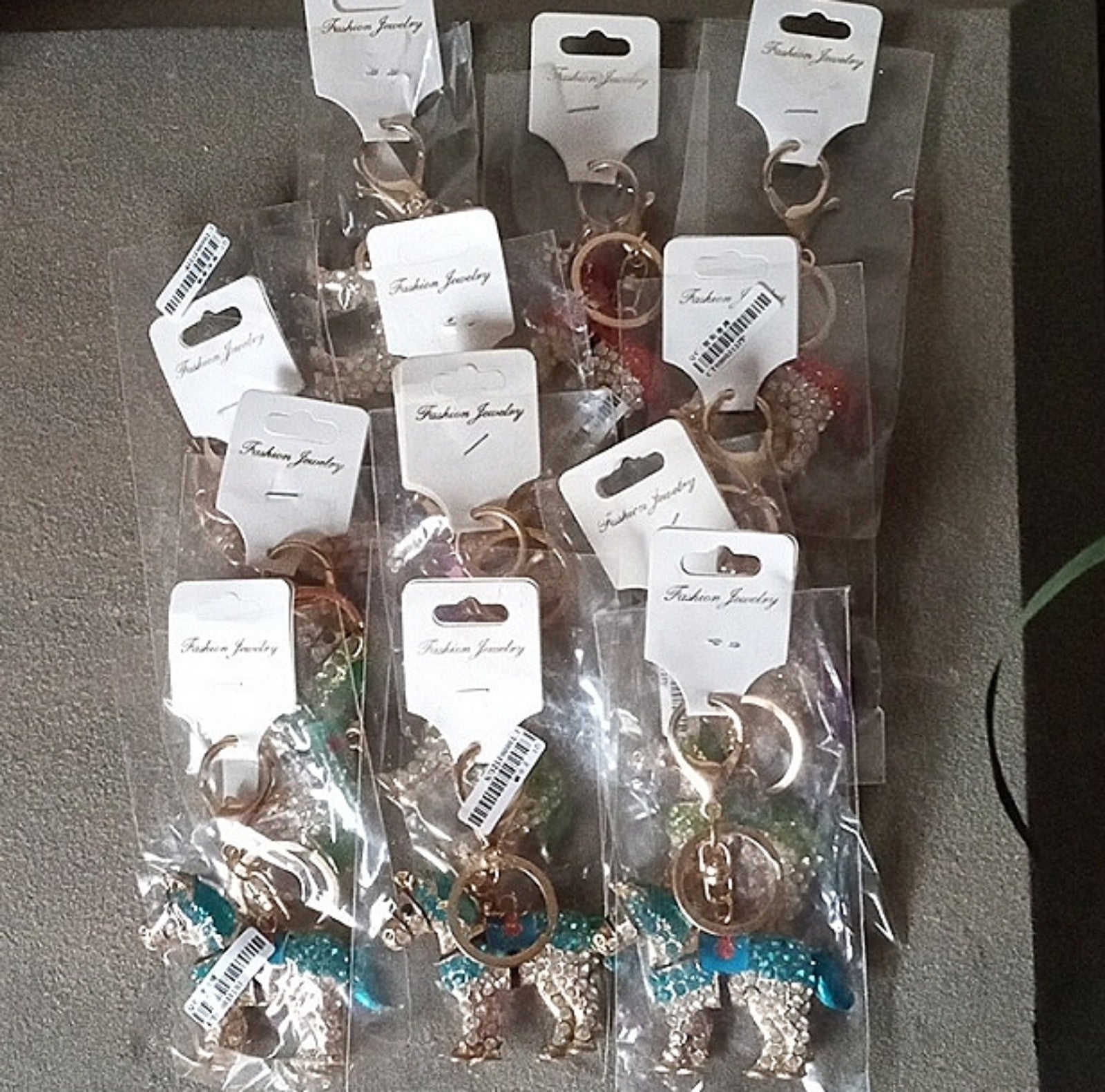 Wholesale Lot of 12 Rhinestone Horses - Blue, Green, Purple, and Red Keychains