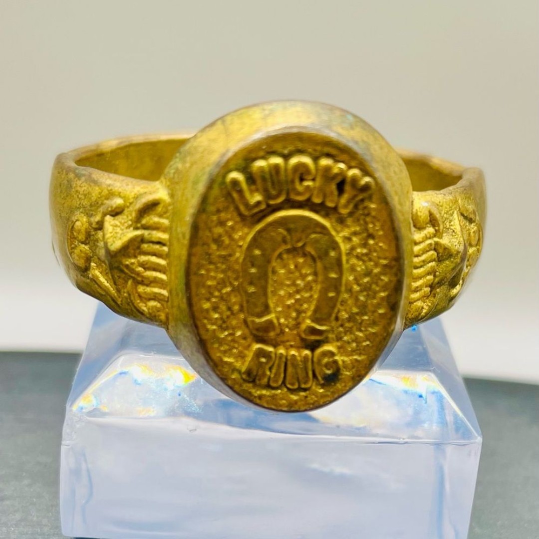 Vintage lucky ring souvenir carnival giant ring. Plastic with gold plating.