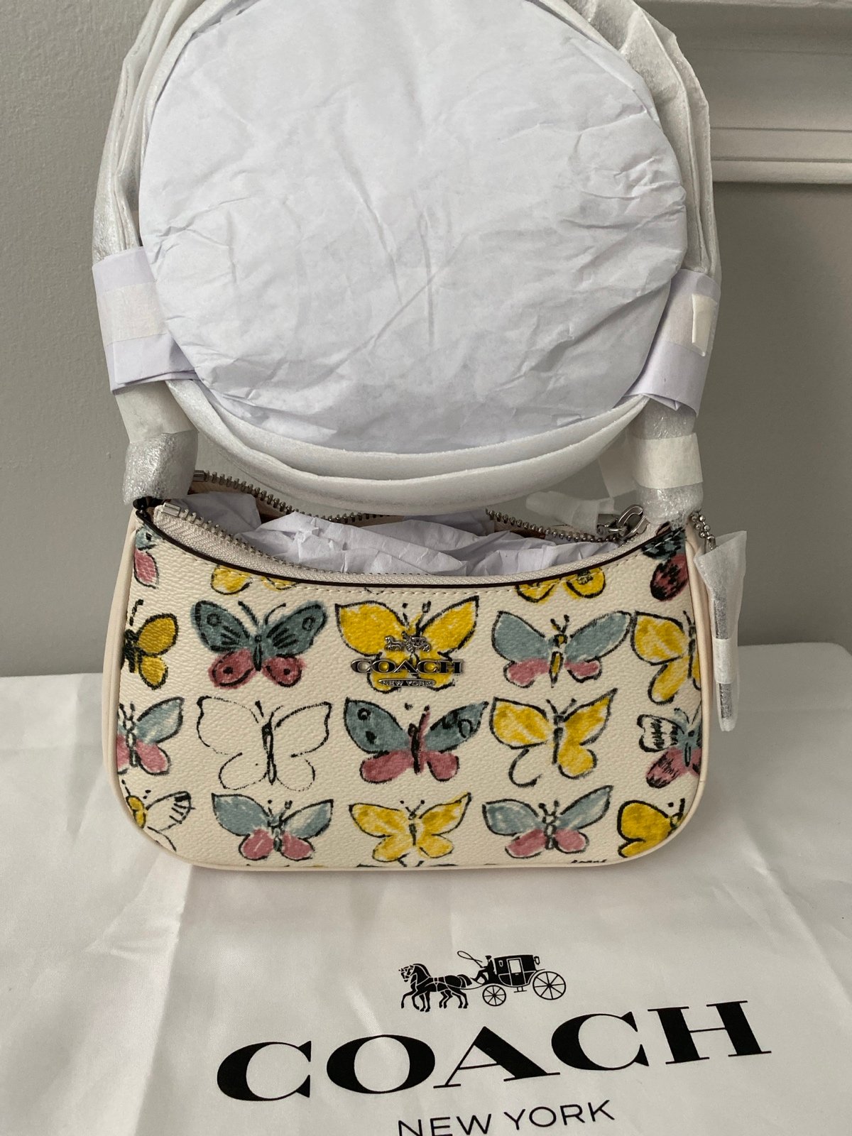 NWT Coach mini teri butterfly