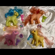 Lot of 4 MLP G1 earth ponies with stickers, combs, ribbons