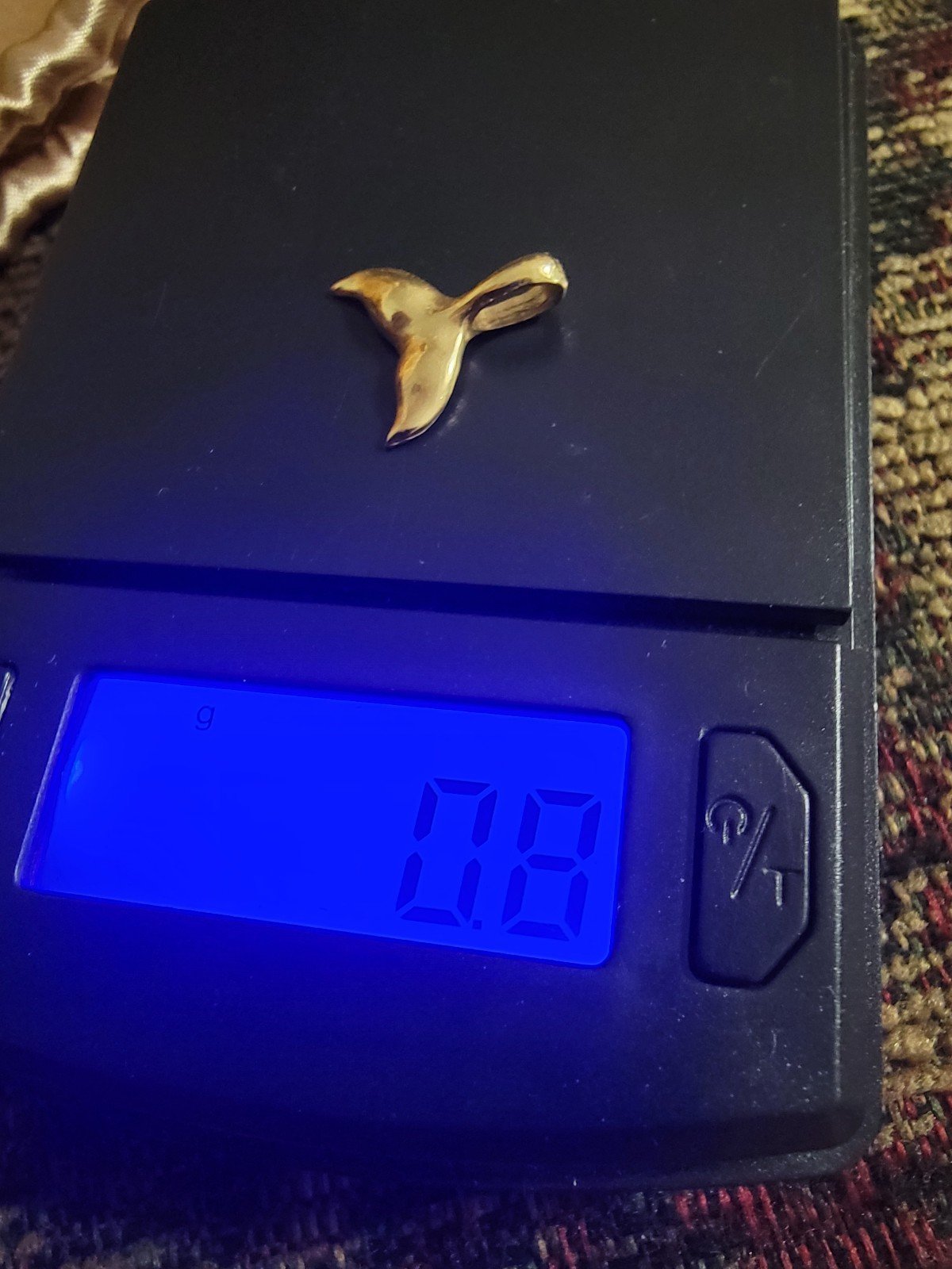 14 kt gold whale tail
