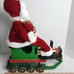 Santa's Christmas Empire Santa Riding On Train | H:16 x L;14 x 10½ | NWT.