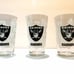 Three Raiders Pint glasses