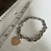 Zales sterling silver heart tag bracelet, heart rose gold plated