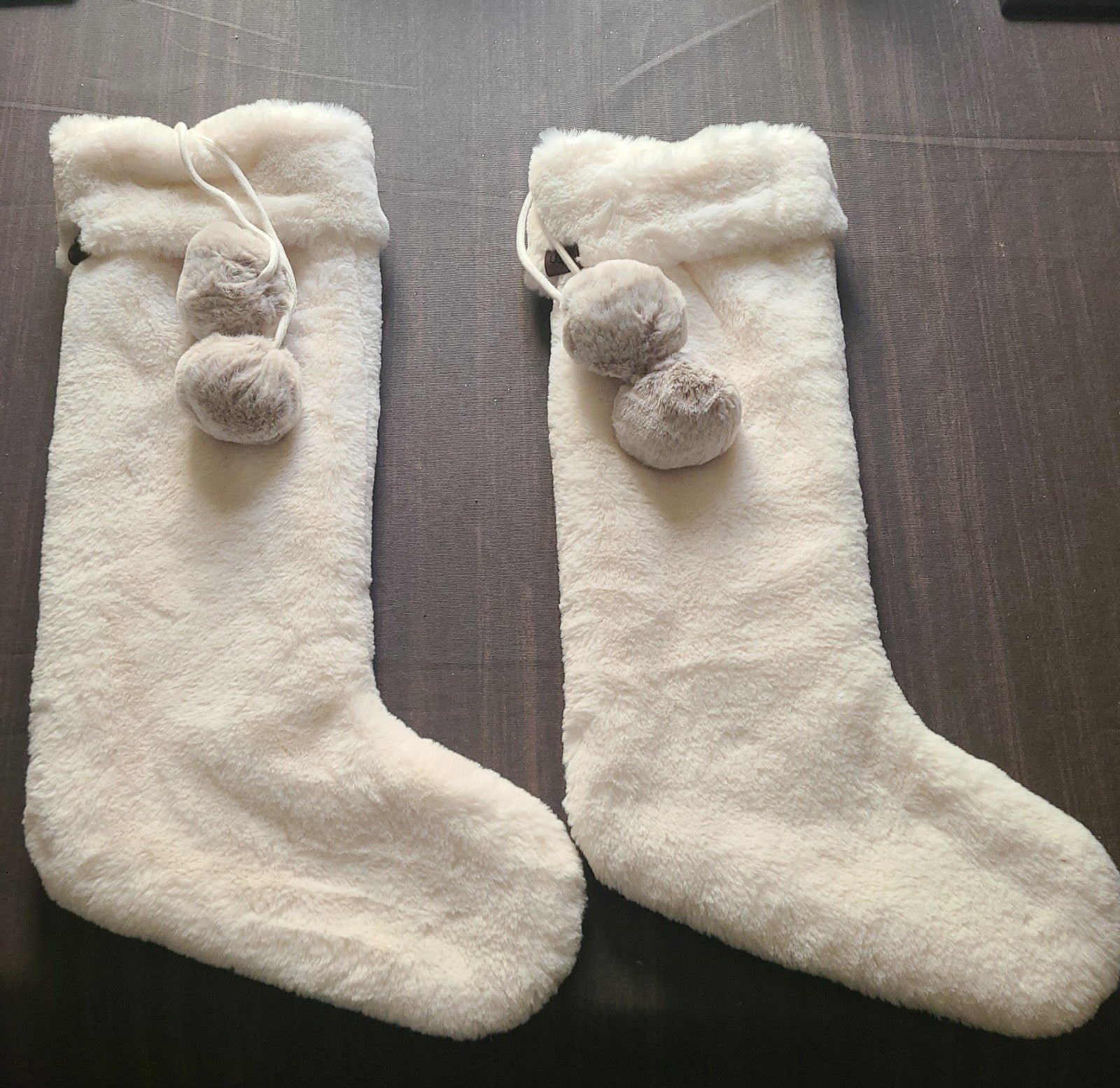 2 UGG polar stocking pompom