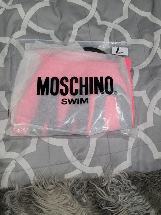 Neon pink mens Moschino swim shorts 150