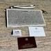 NWT Coach vintage white and silver shiny wallet wristlet