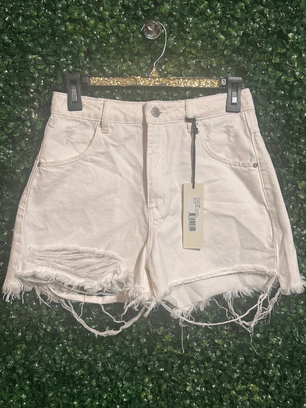 Rolla’s Distressed White High Rise Shorts