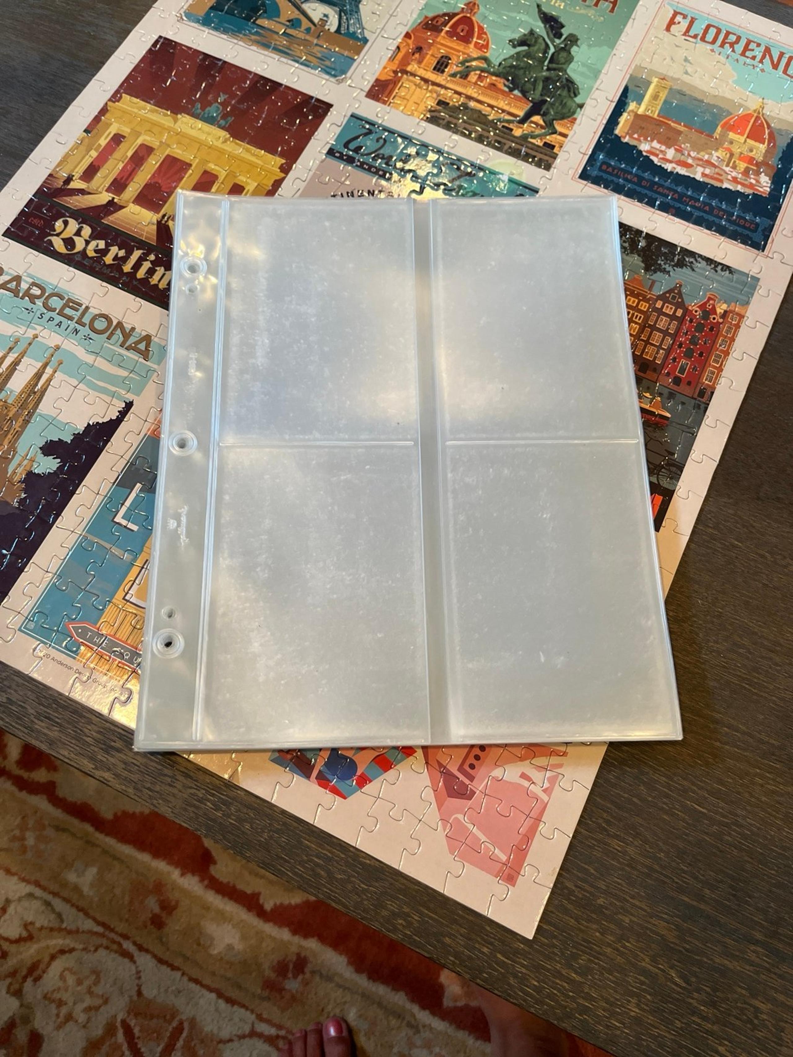 Clear plastic 3 ring photo protector sheets. Each sheet holds 8 photos.