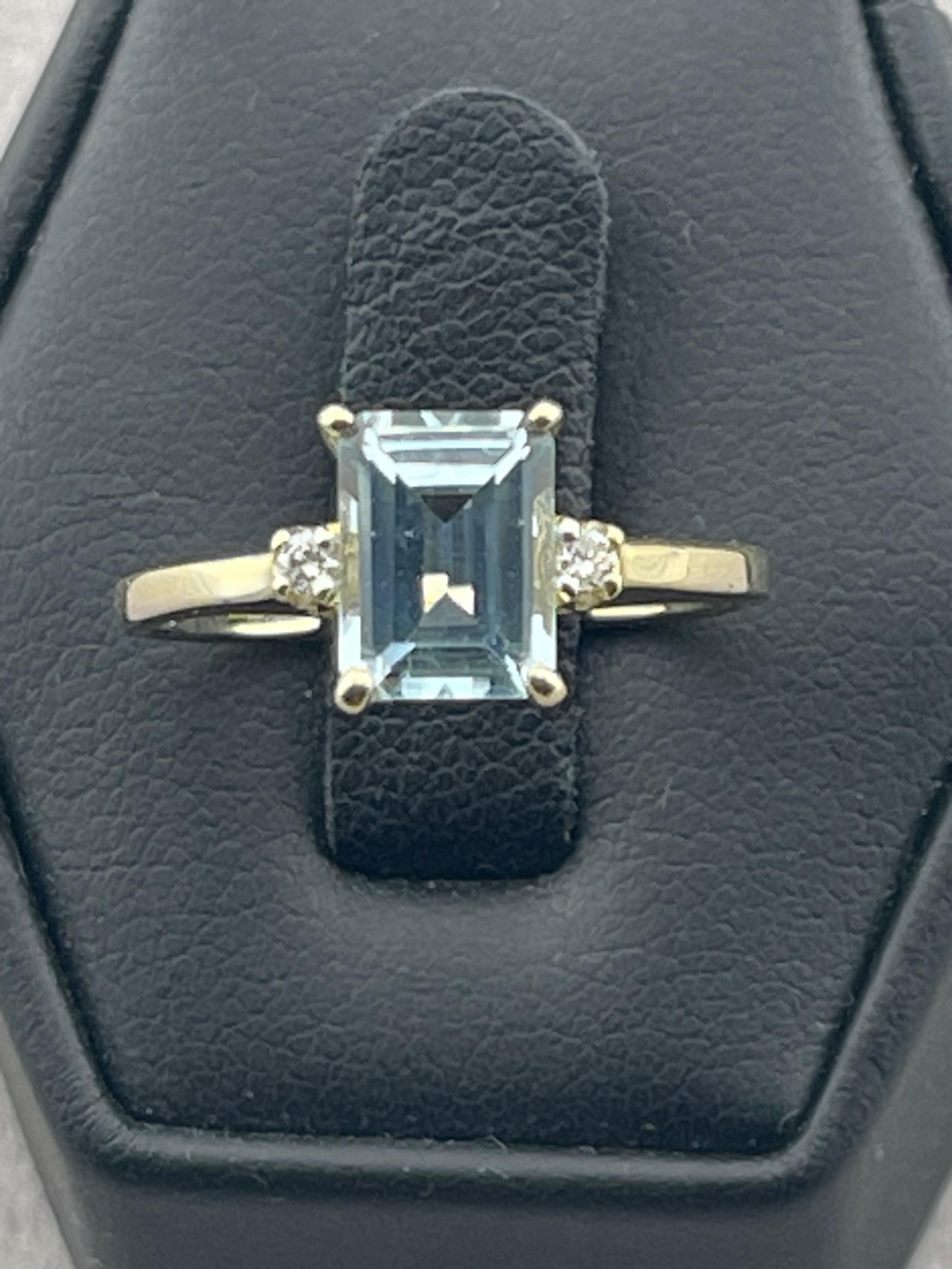 Vintage one, carat, aquamarine and diamond ring 14 karat yellow gold