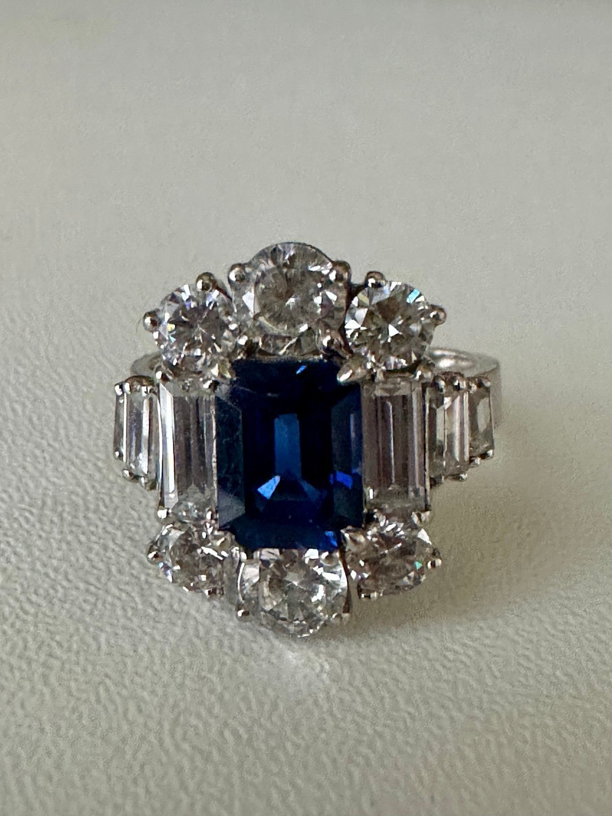 1.5ct Emerald Cut Center with 6 Round Cut Stones of 1.7 TCW on the Top and Botto