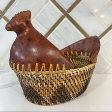 Hand woven rattan wicker chicken basket with wooden chicken head and tail.