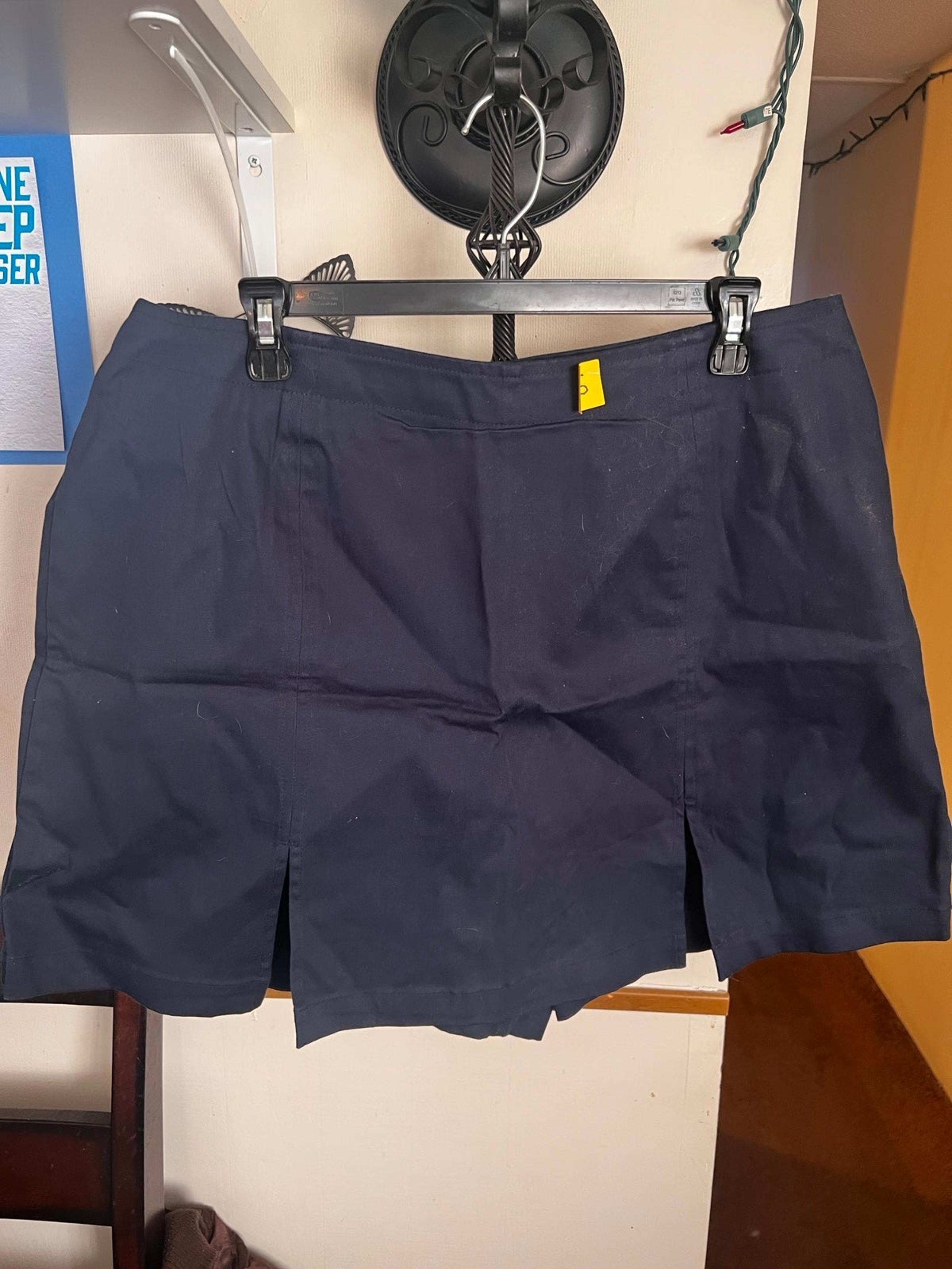 Size 16 Dress Barn pleated skort. Navy blue, zips in the back.