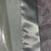 Alcove fleece blanket with satin trim
