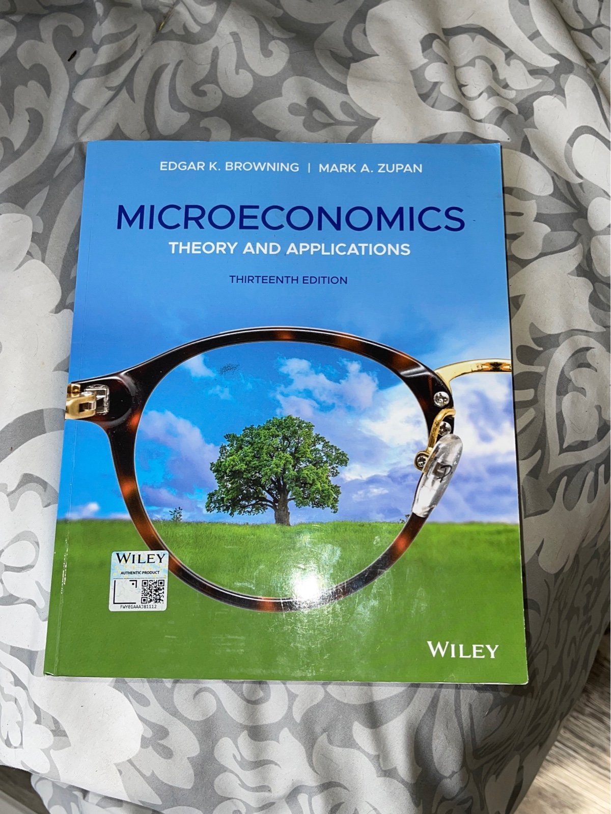 Microeconomics Theory and Applications Thirteenth Edition by Edgar K. Browning