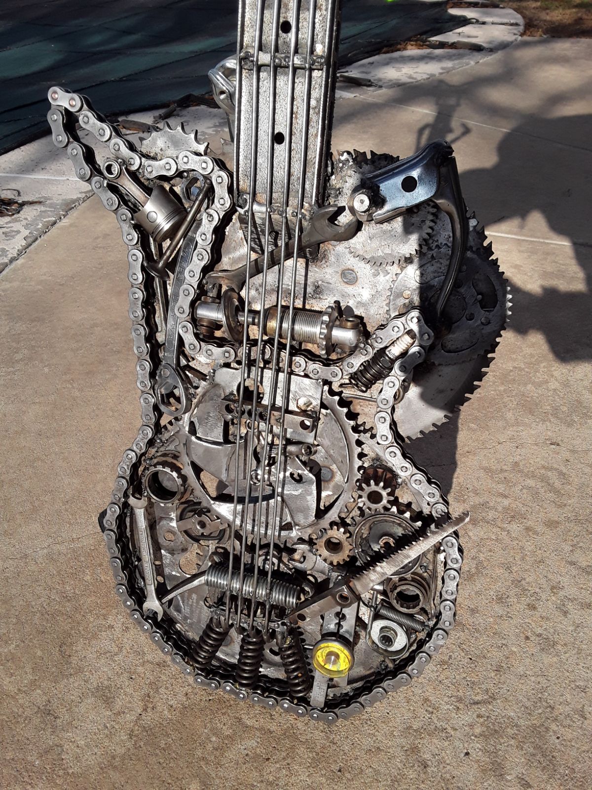 Scrap metal welded guitar