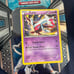 Tin full of random Pokémon cards