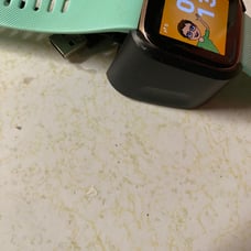Fitbit Versa Smartwatch in Peach/Rose Gold