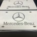 Mercedes Brand New Front Vanity Metal Plate Frame Holder (2 Pack)