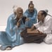 Set of 2 chinoiserrie figurines w/ 3 men