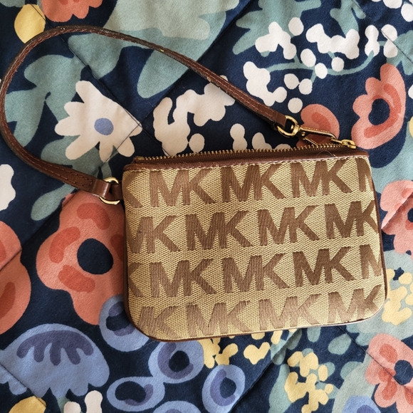 Michael Kors Logo Jacquard Wristlet in cognac