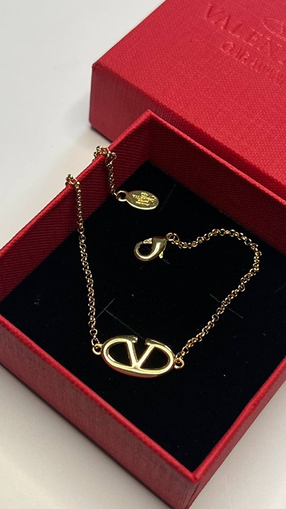 VALENTINO gold tone metal charm bracelet