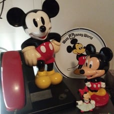 Old Mickey Mouse telephone and plate and
