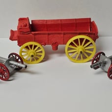 Vintage Cast Iron Barclay Howlitzer Cannons with Auburn Rubber Toy Red Wagon
