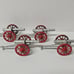 Vintage Cast Iron Barclay Howlitzer Cannons with Auburn Rubber Toy Red Wagon