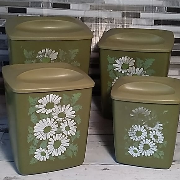 Vintage 1970s green daisy canister set
