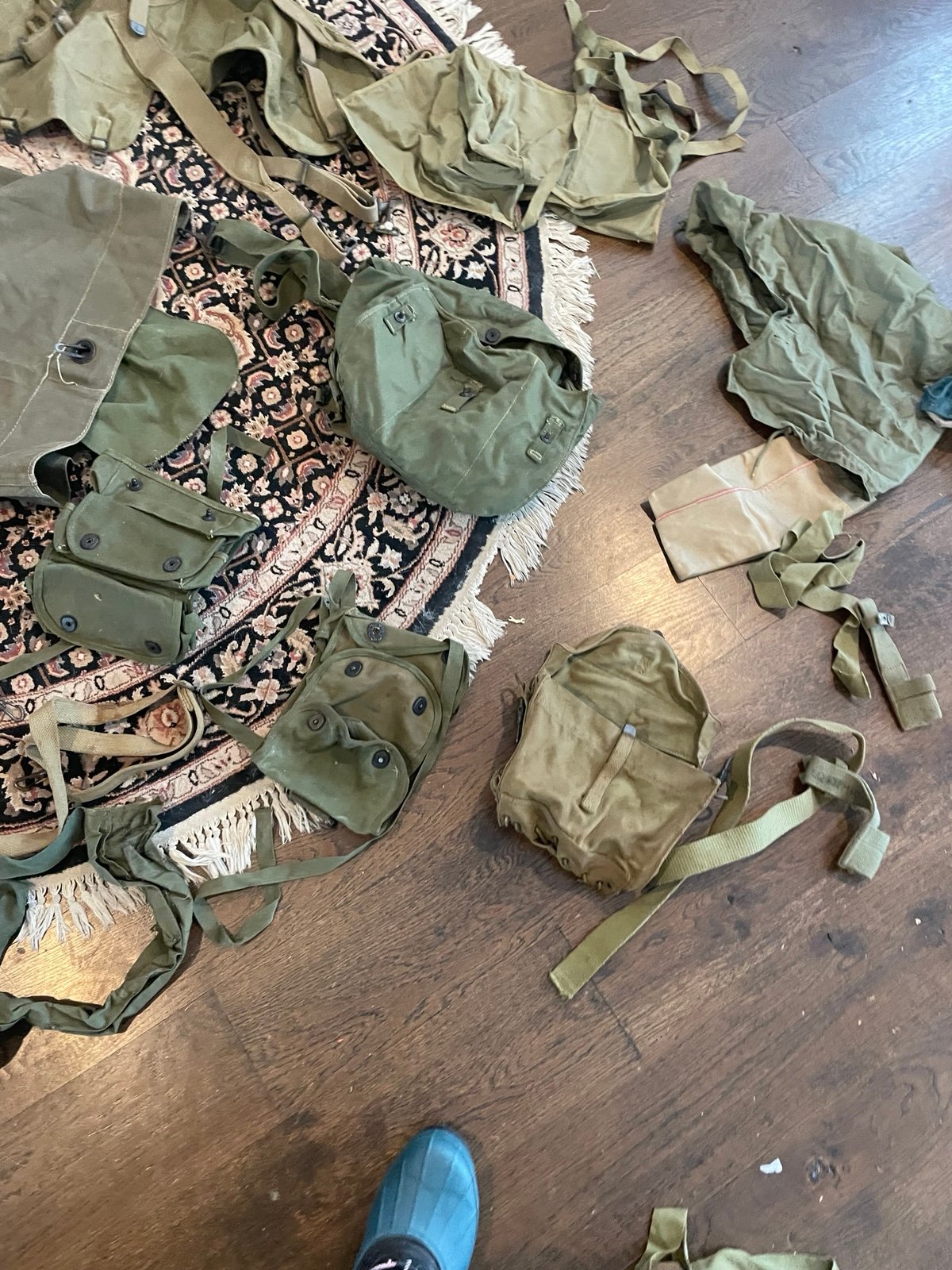 huge lot of Army duffle bags from Korean War bags, Belts ,and more