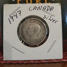 1947 silver Canadian quarter