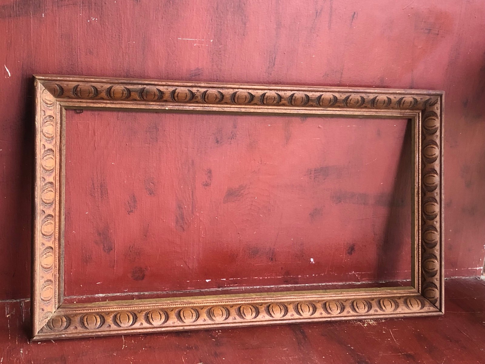 9663 Large Wooden Carved Raw Folkart Art Frame Approximately 15.5” X 27.25”.