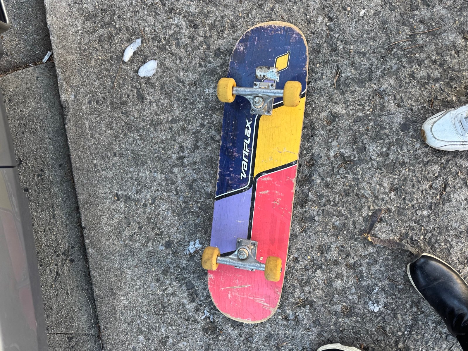 Varies vintage multicolored skateboard