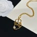 Gold triple tassel necklace