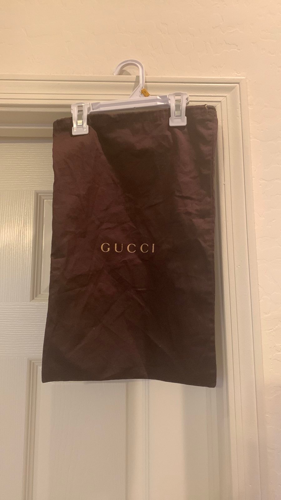 GUCCI brown dust bag.