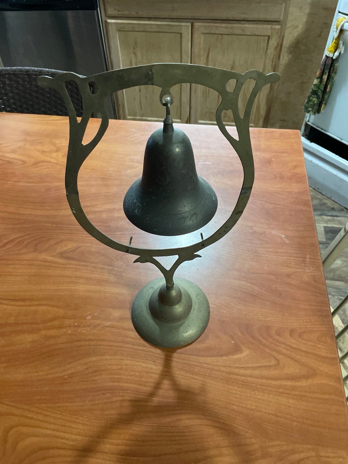 This is a vintage brass dinner gong.